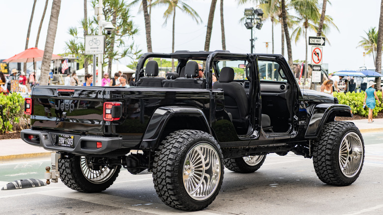 Black Jeep Gladiator rear 3/4 shot with aftermarket whels