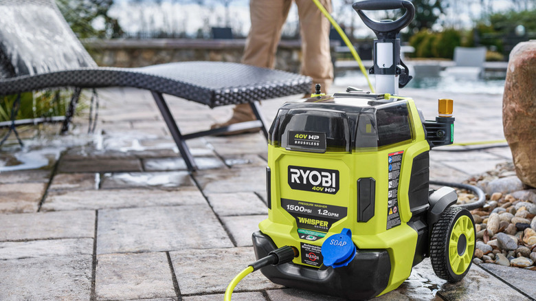 40V Ryobi pressure washer being used on patio