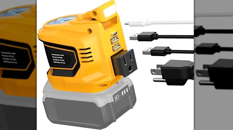 Ecarke power inverter and several cords on white background
