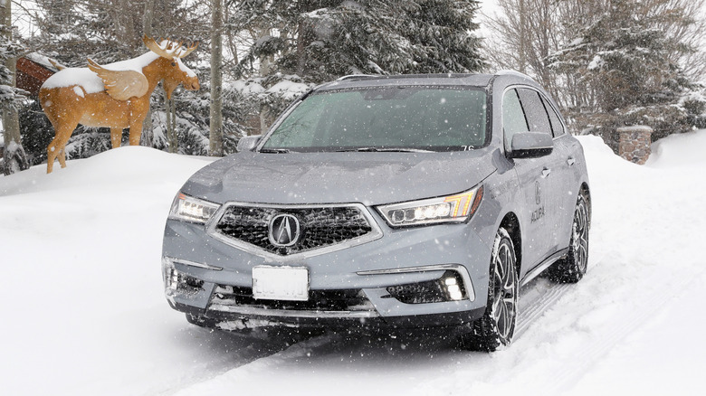 silver 2017 acura mdx in snow