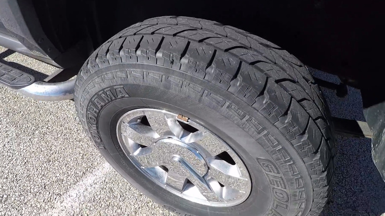 A set of Yokohama Geolandar A/T G015 tires on a truck