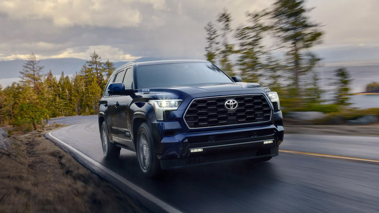 A blue Toyota Sequoia driving
