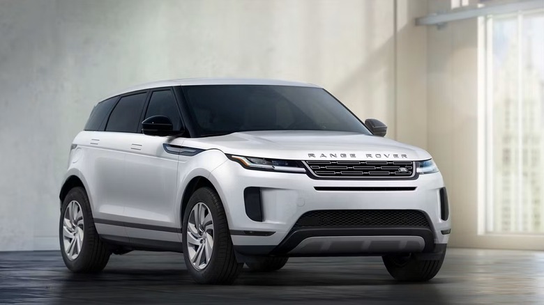 Fuji white Range Rover Evoque parked indoor