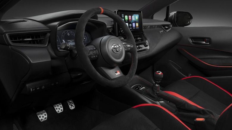 Close shot of GR Corolla Interior showing seats, shifter, and dash