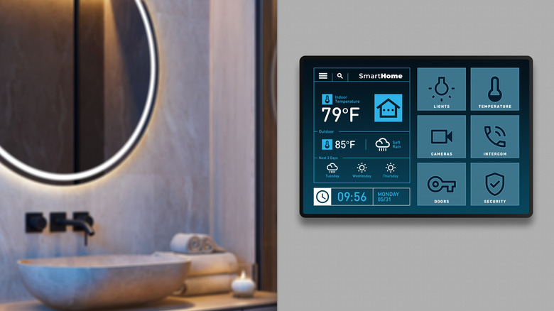 Smart home thermostat tablet display on a wall outside a bathroom