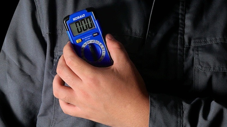 Person holding Kobalt multimeter