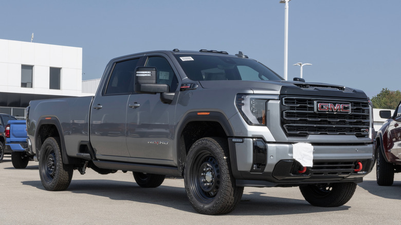 Gray GMC Duramax equipped truck on dealer lot