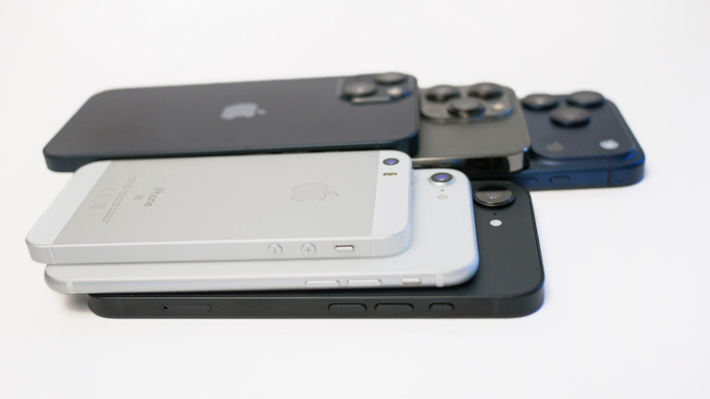 Multiple iPhone models on a white background