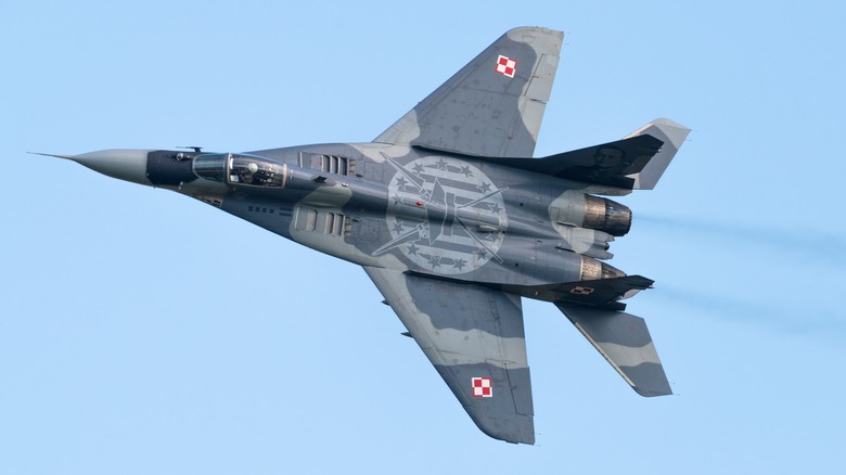 A Polish MiG-29 Fulcrum flying over blue skies