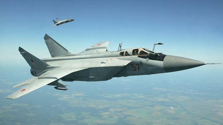 Two MiG-31s flying in a loose formation