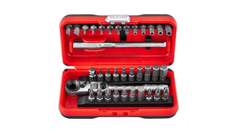 The Icon Locking Flex Head Ratchet with a 35-bit set in an open carrying case by Icon