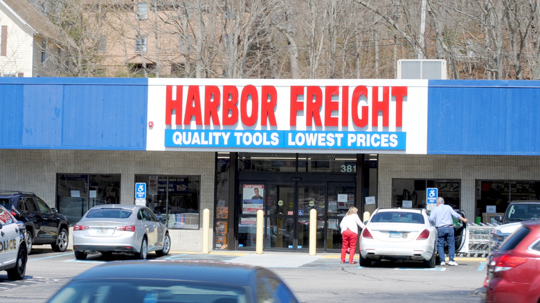 The entrance of a Harbor Freight store, the tagline reads"Quality Tools Lowest Prices"