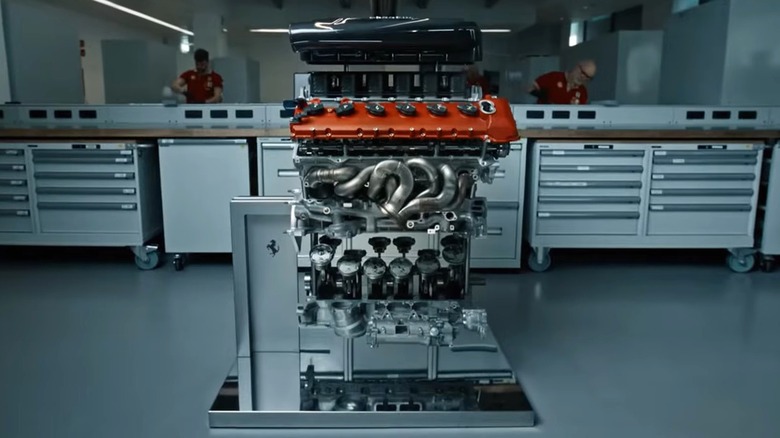 A fully assembled Ferrari F80 V6 engine in a factory.