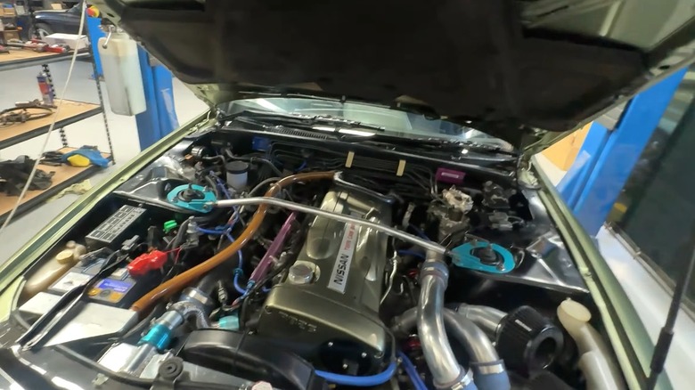 Heavily modified Nissan VR38DETT engine in the bay of a GT-R.