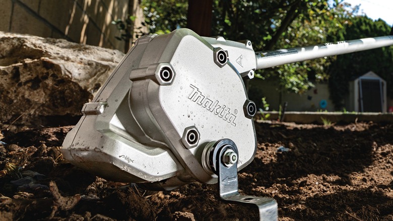 Makita Cultivator Hoe/Weeding Couple Shaft Attachment in use