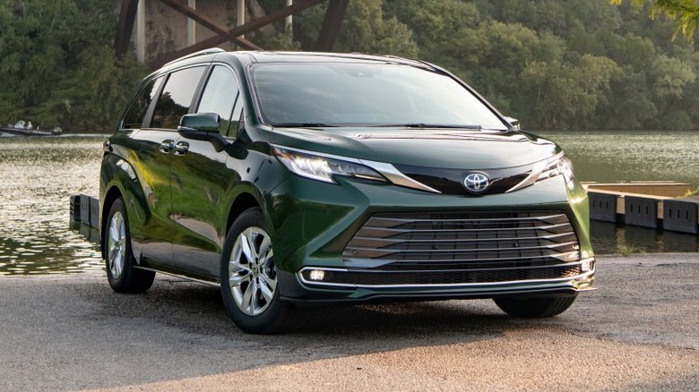 Toyota Sienna Hybrid parked by river