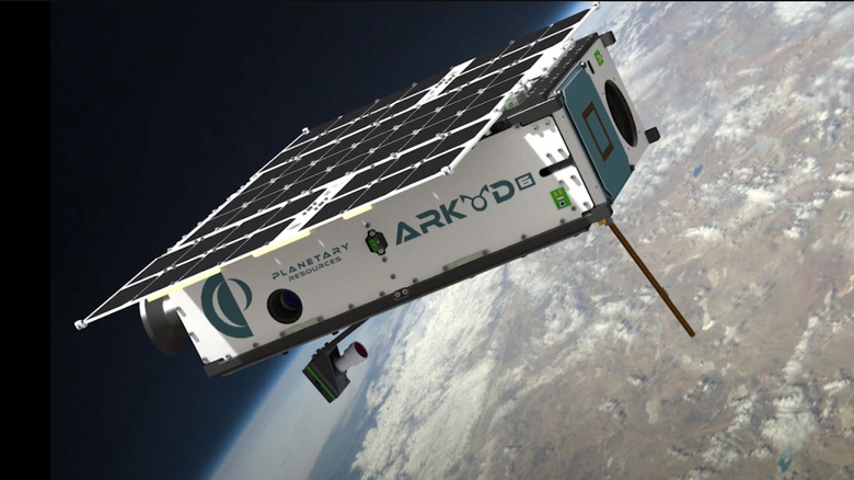 An artist's illustration of Arkyd-6 spacecraft in Earth orbit