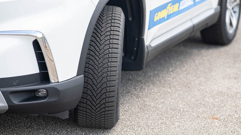 A Goodyear Assurance WeatherReady 2 on a Goodyear-branded car