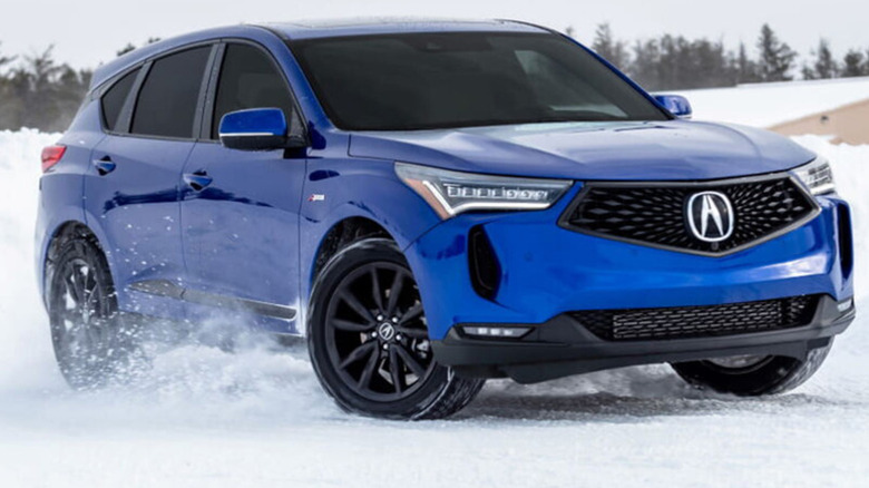 A blue car equipped with Pirelli Cinturato WeatherActive tires