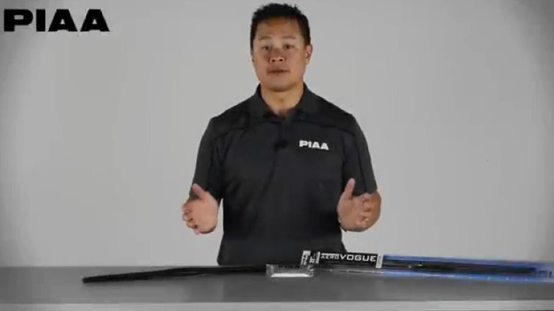 person presenting wiper blade