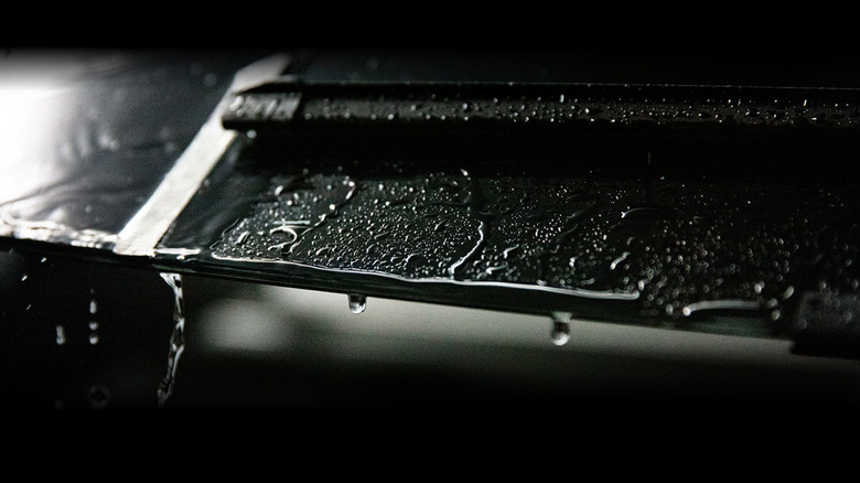 wiper blade on car with rain