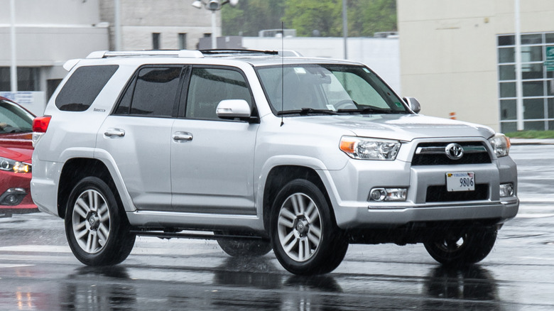 Toyota 4Runner sitting on a lot in the rain