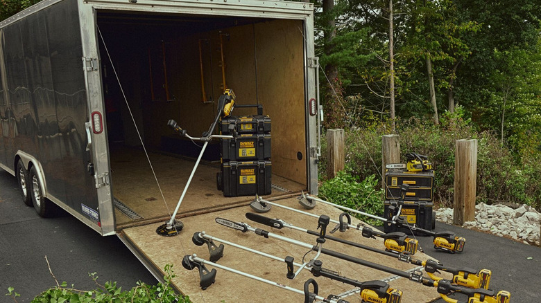 Various DeWalt yard tools, mostly string trimmers.