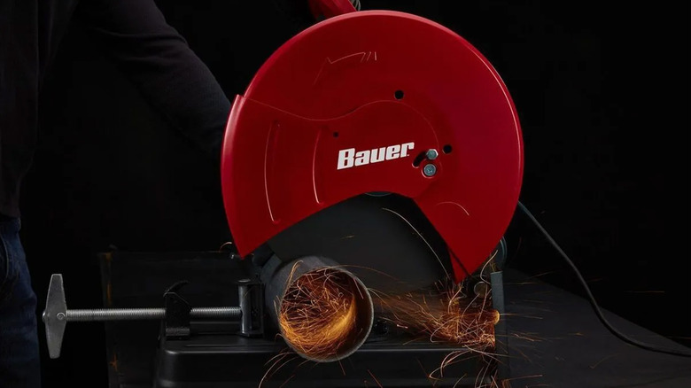 A Bauer cut off saw throwing sparks mid operation
