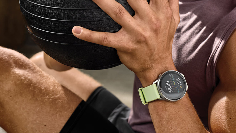 A man wearing the Garmin Venu 4 while exercising.