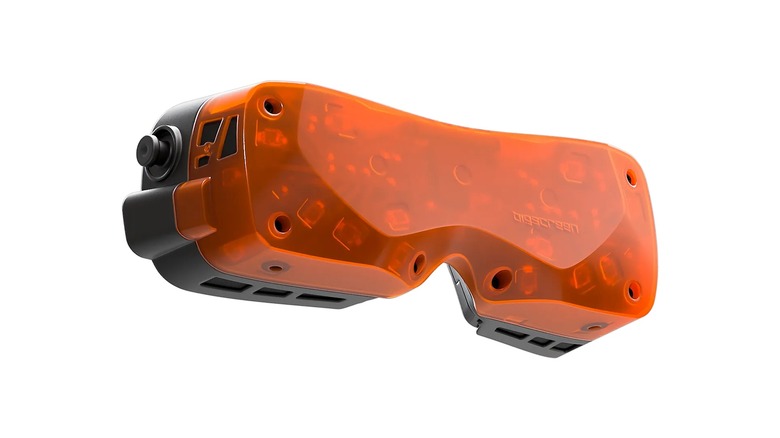 A Bigscreen Beyond 2 headset in orange without a strap