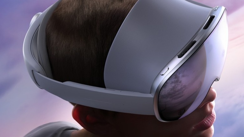 A person wearing a Samsung Galaxy XR headset with clouds in the background