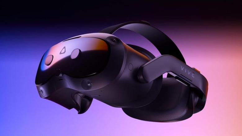 A Vive Focus Vision VR headset with a gradient background