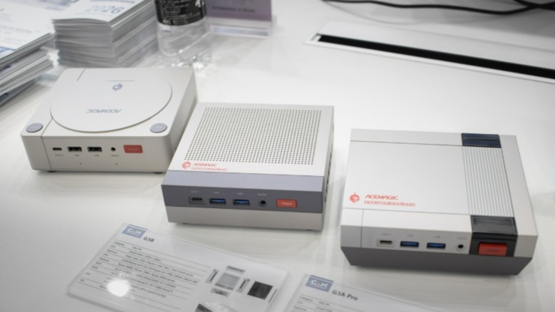 the Acemagic Retro X5 mini PC showing its front ports and red power button