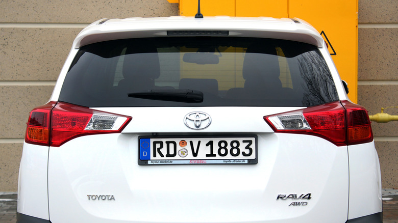Rear view of a white Toyota RAV4