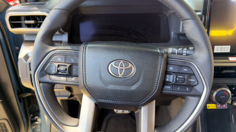 Steering wheel and dashboard view of a Toyota