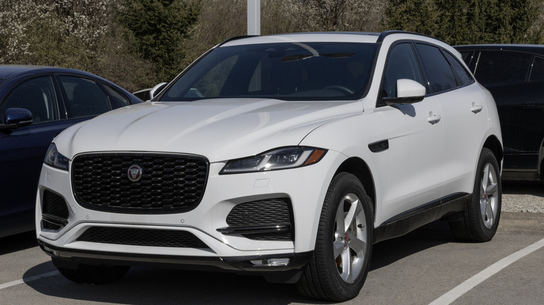 A white Jaguar F-Pace in a parking lot