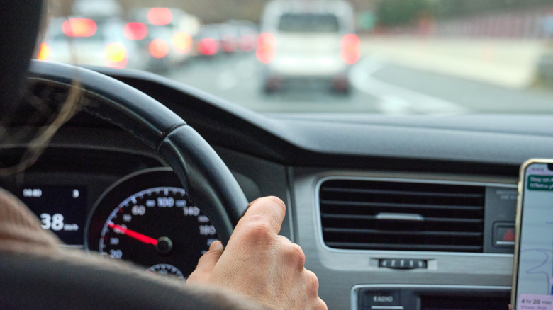 woman driving a car at 38 miles per hour