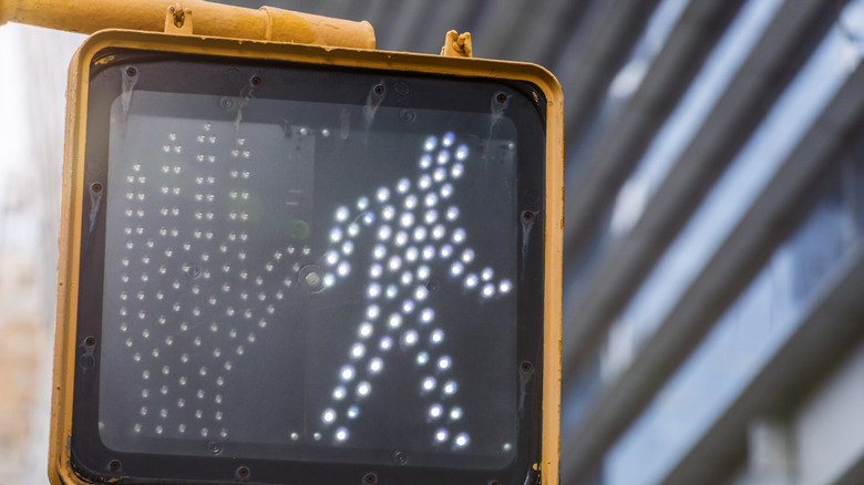 pedestrian crossing sign at intersection