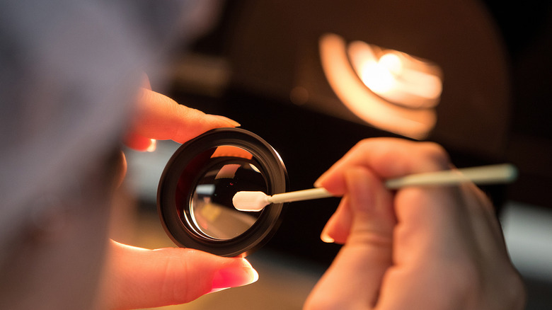 cleaning a lens