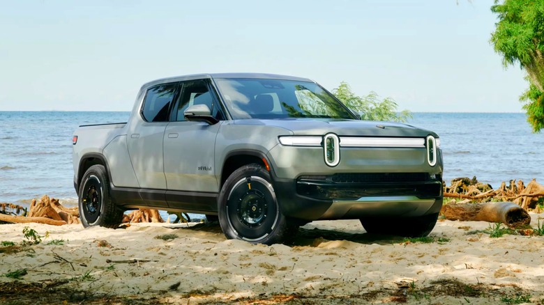 A white 2026 Rivian R1T parked
