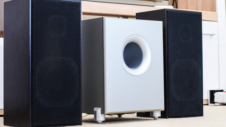 A subwoofer between two speakers.