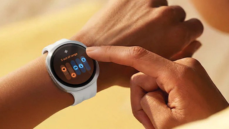 A person looking at their exercise metrics on a Galaxy Watch.