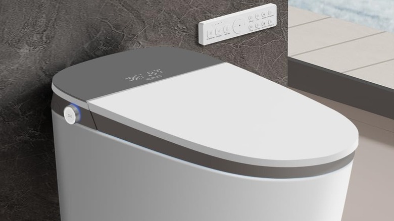 An EPLO Smart Toilet with a closed lid powered on