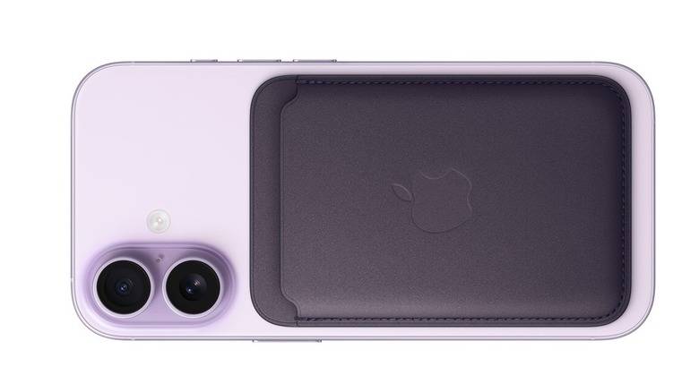 A MagSafe wallet on the back of an iPhone, white background