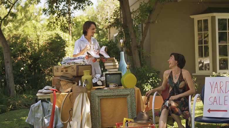 couple having a garage sale