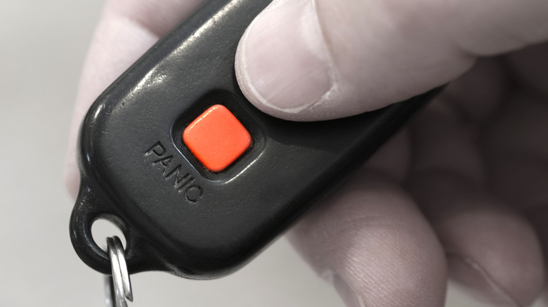 A display of a panic button on a key fob