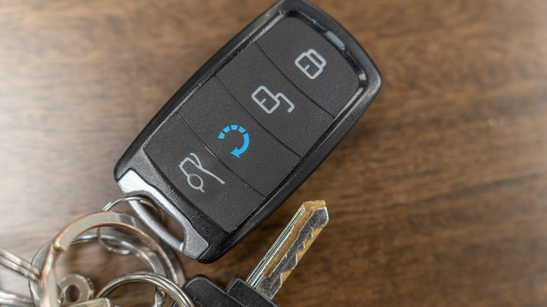 Car key fob with lock, unlock, trunk, and remote start buttons