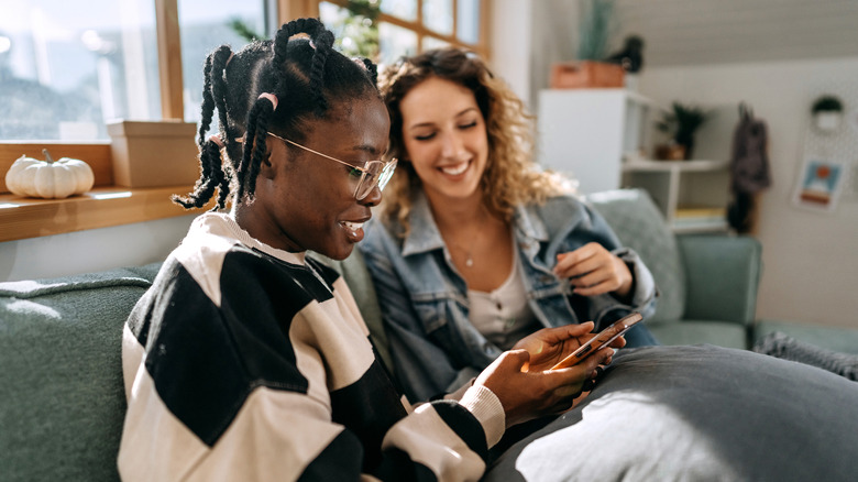 Two people sharing a phone without leaking private data.
