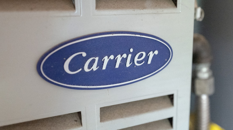 Close-up of Carrier logo on a HVAC unit