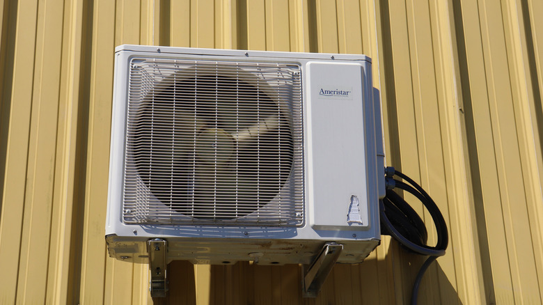 Wall-mounted Ameristar air conditioning unit.